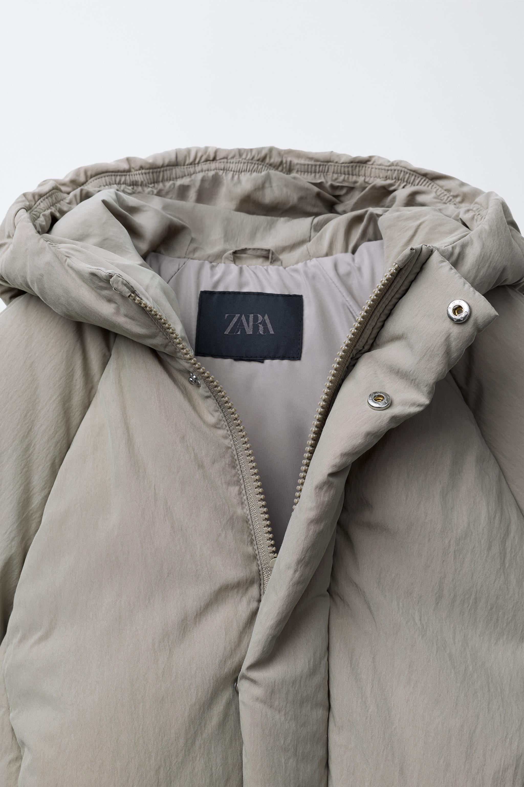 MANTEAU MATELASSÉ CAPUCHE LOGO EN RELIEF
